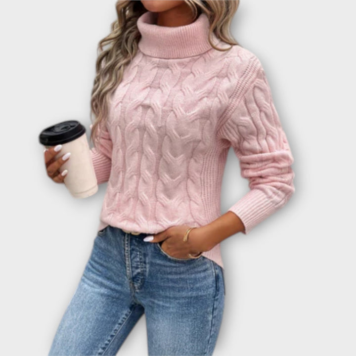 Amelia - Pull de cuello alto elegante en rosa con motivo de trenzas