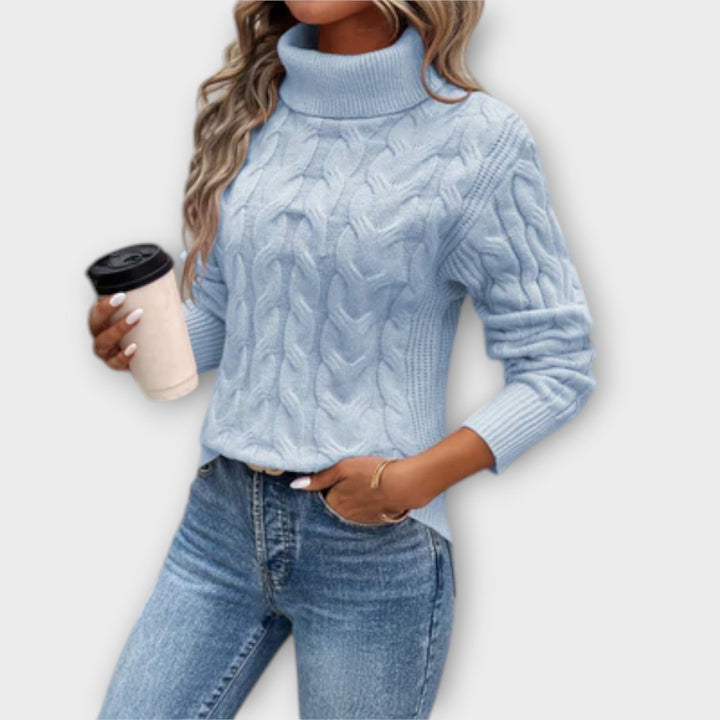 Amelia - Pull de cuello alto elegante en rosa con motivo de trenzas