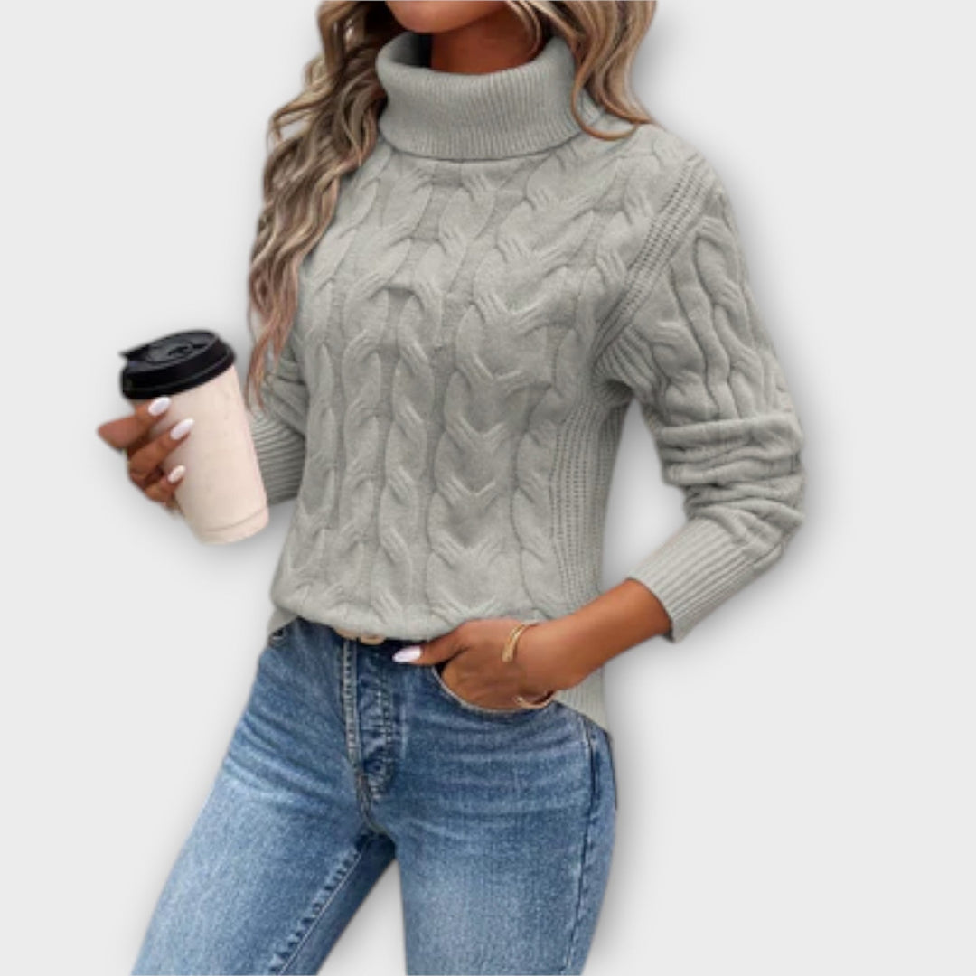 Amelia - Pull de cuello alto elegante en rosa con motivo de trenzas
