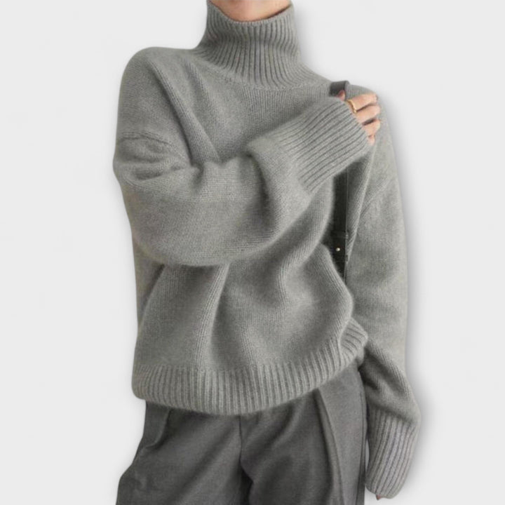 Mera - Suéter de cachemire beige con cuello alto