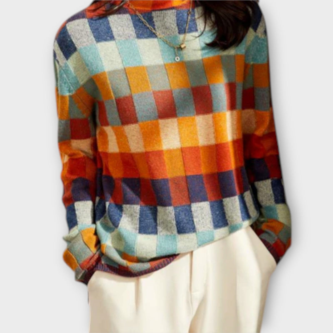 Erika - Suéter de cuello alto en patchwork colorido con patrón a cuadros