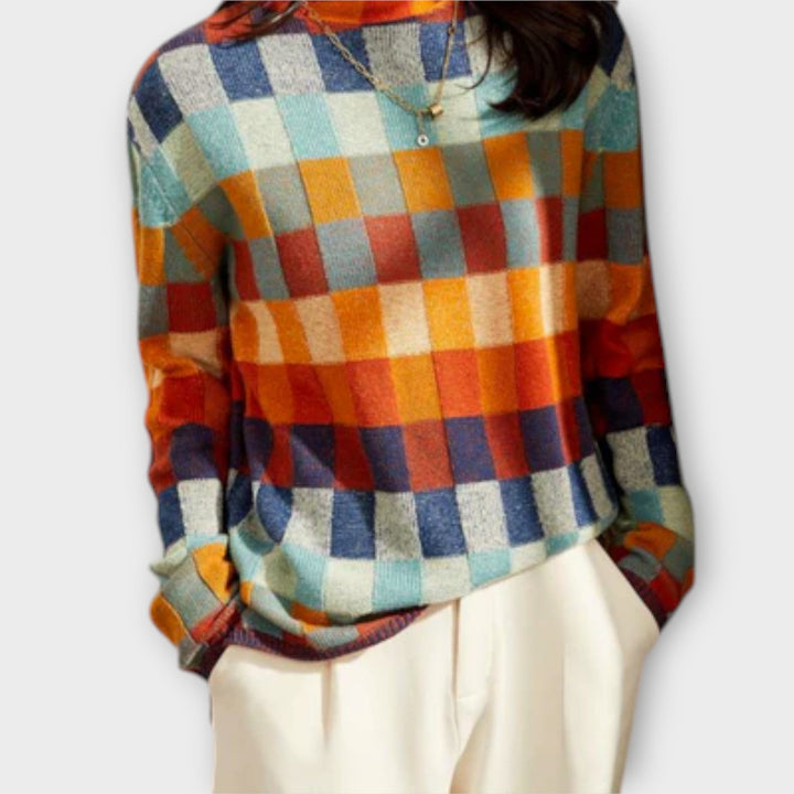 Erika - Suéter de cuello alto en patchwork colorido con patrón a cuadros