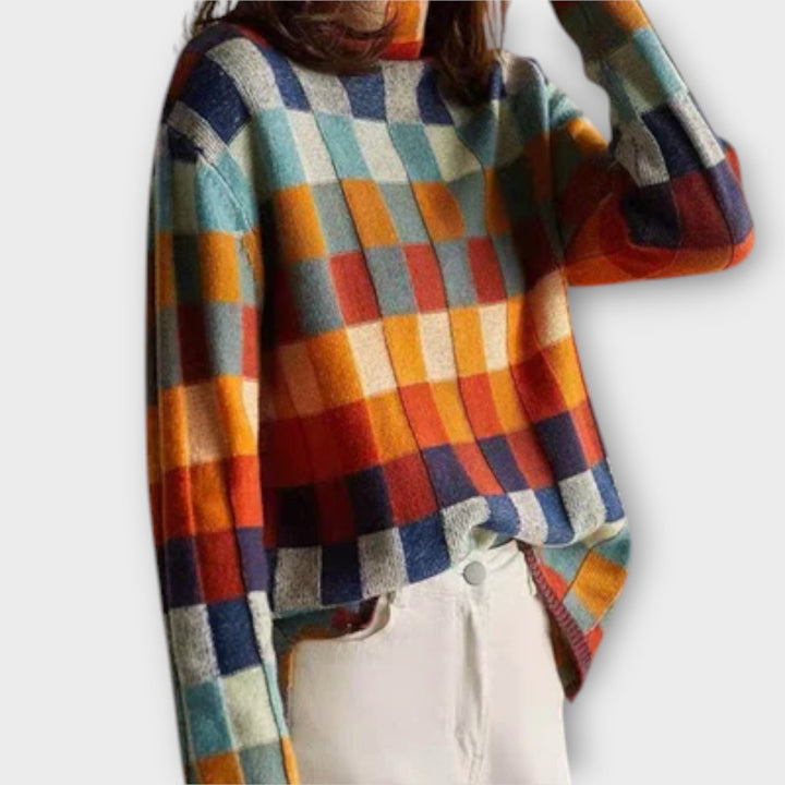 Erika - Suéter de cuello alto en patchwork colorido con patrón a cuadros