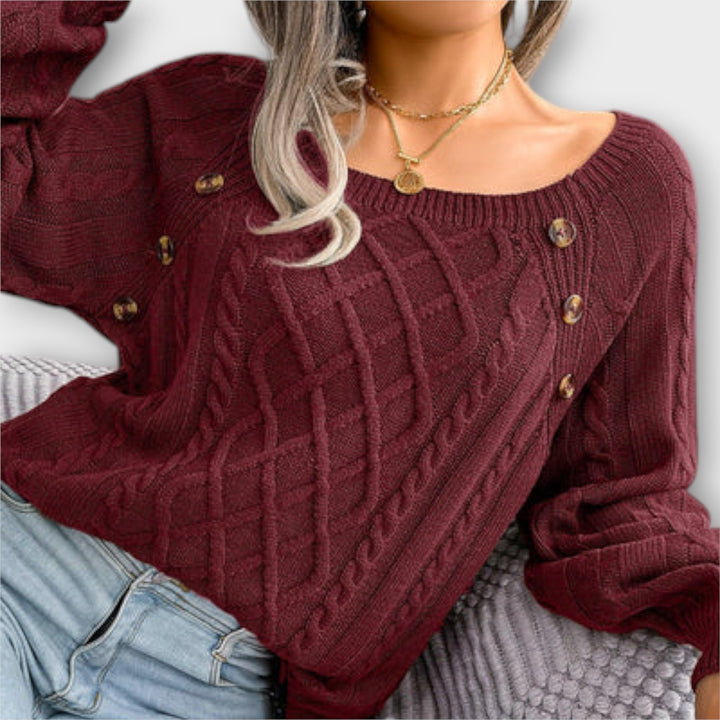 Malia - Suéter gris oscuro con botones y diseño de trenzas