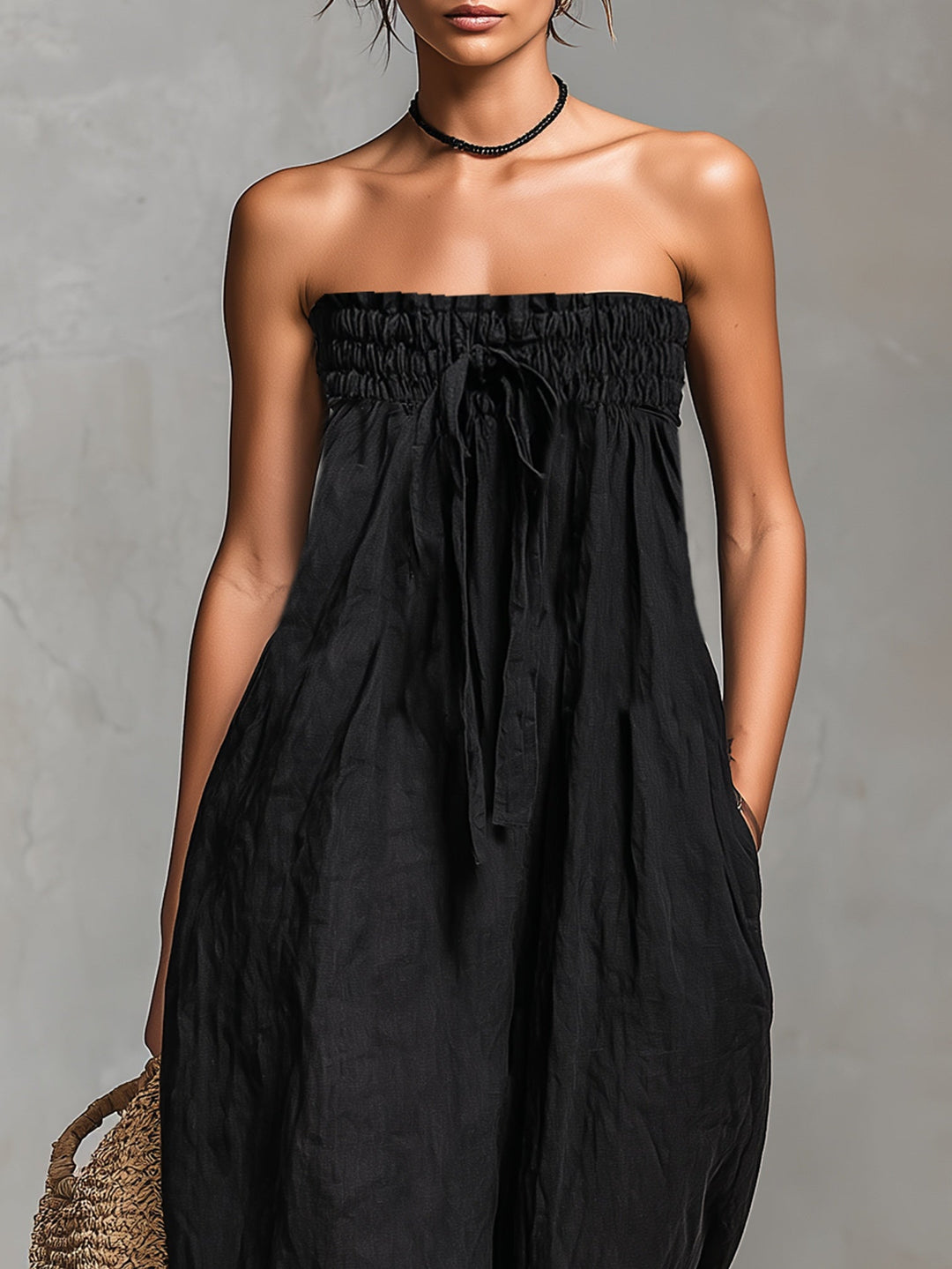 Nina | Mono Sin Tirantes – Elegante, Con Detalle de Lazo