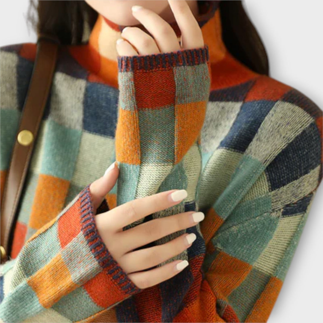 Erika - Suéter de cuello alto en patchwork colorido con patrón a cuadros