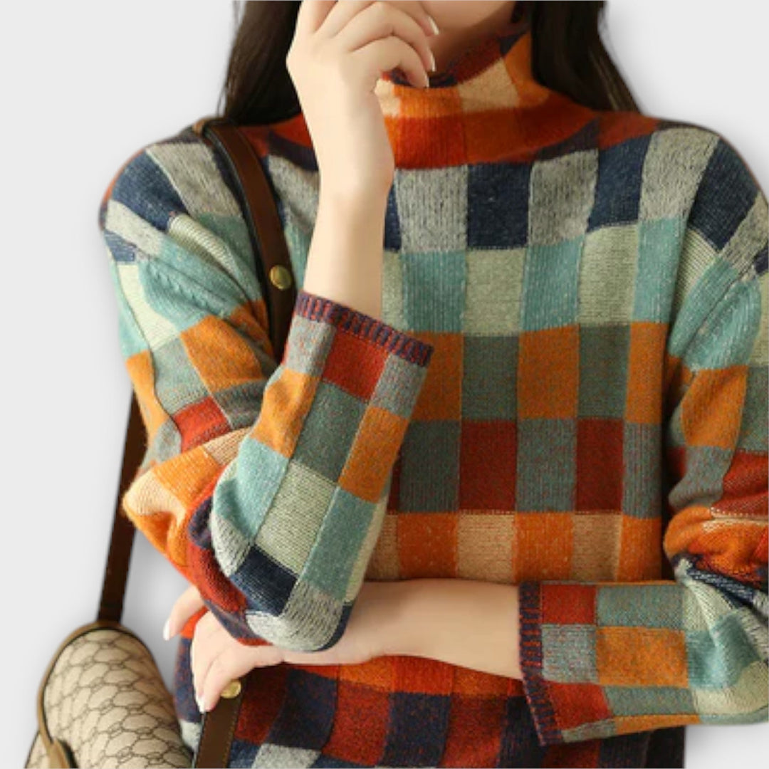 Erika - Suéter de cuello alto en patchwork colorido con patrón a cuadros