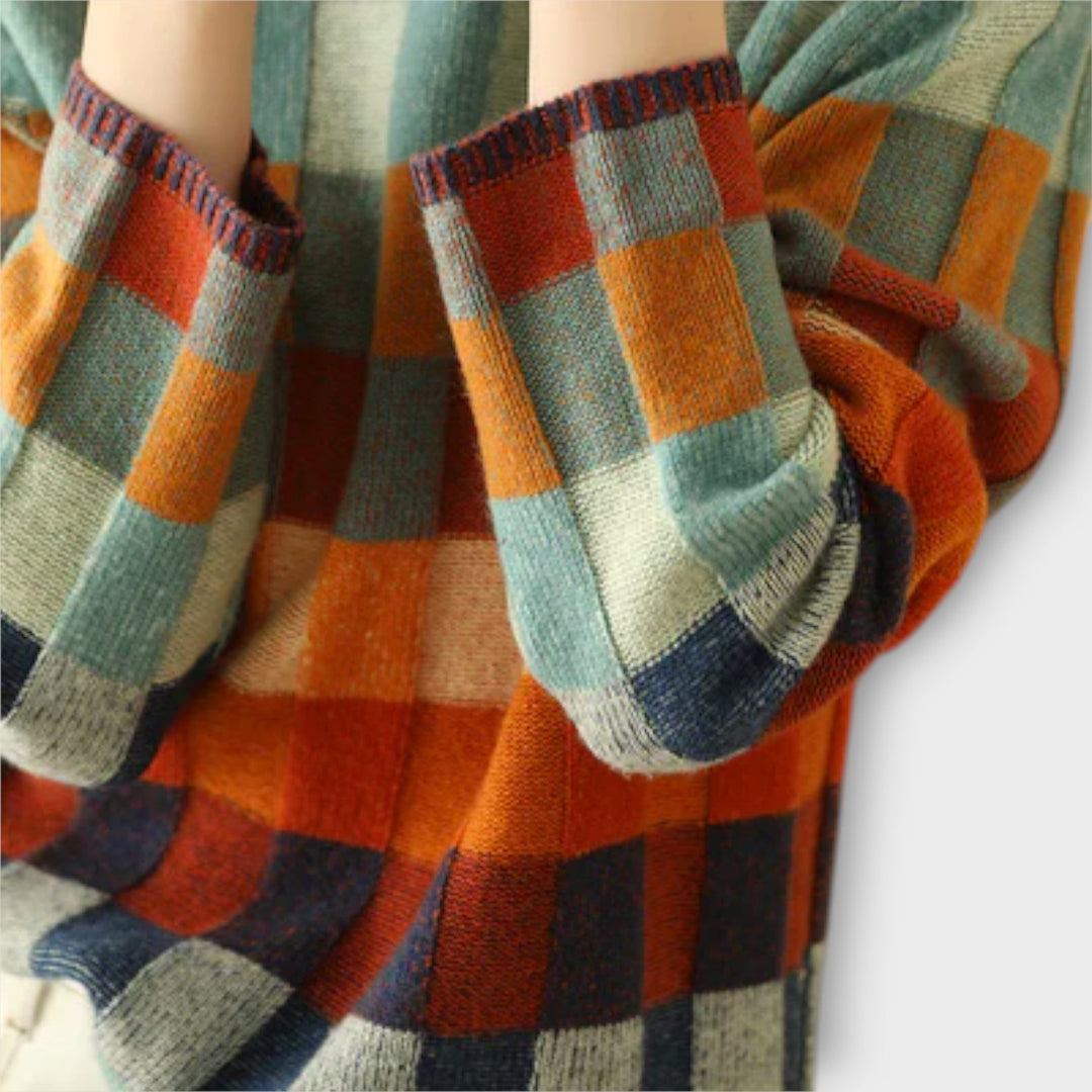 Erika - Suéter de cuello alto en patchwork colorido con patrón a cuadros